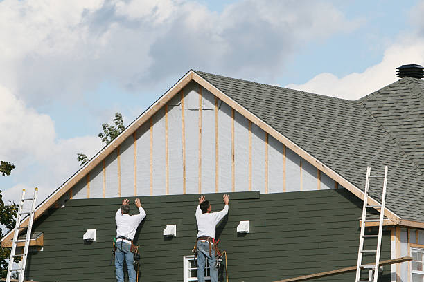 Professional Siding technician working in New York, NY